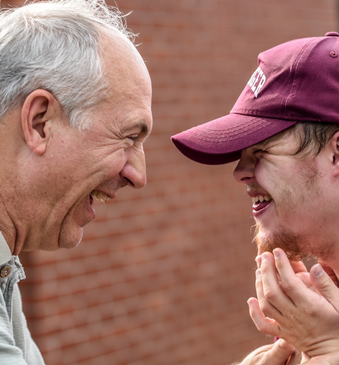 two man laughing at each other